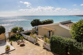 Blue house on the sea, Avola